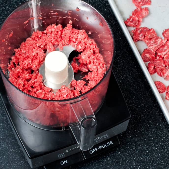 Grinding meat in food processor top